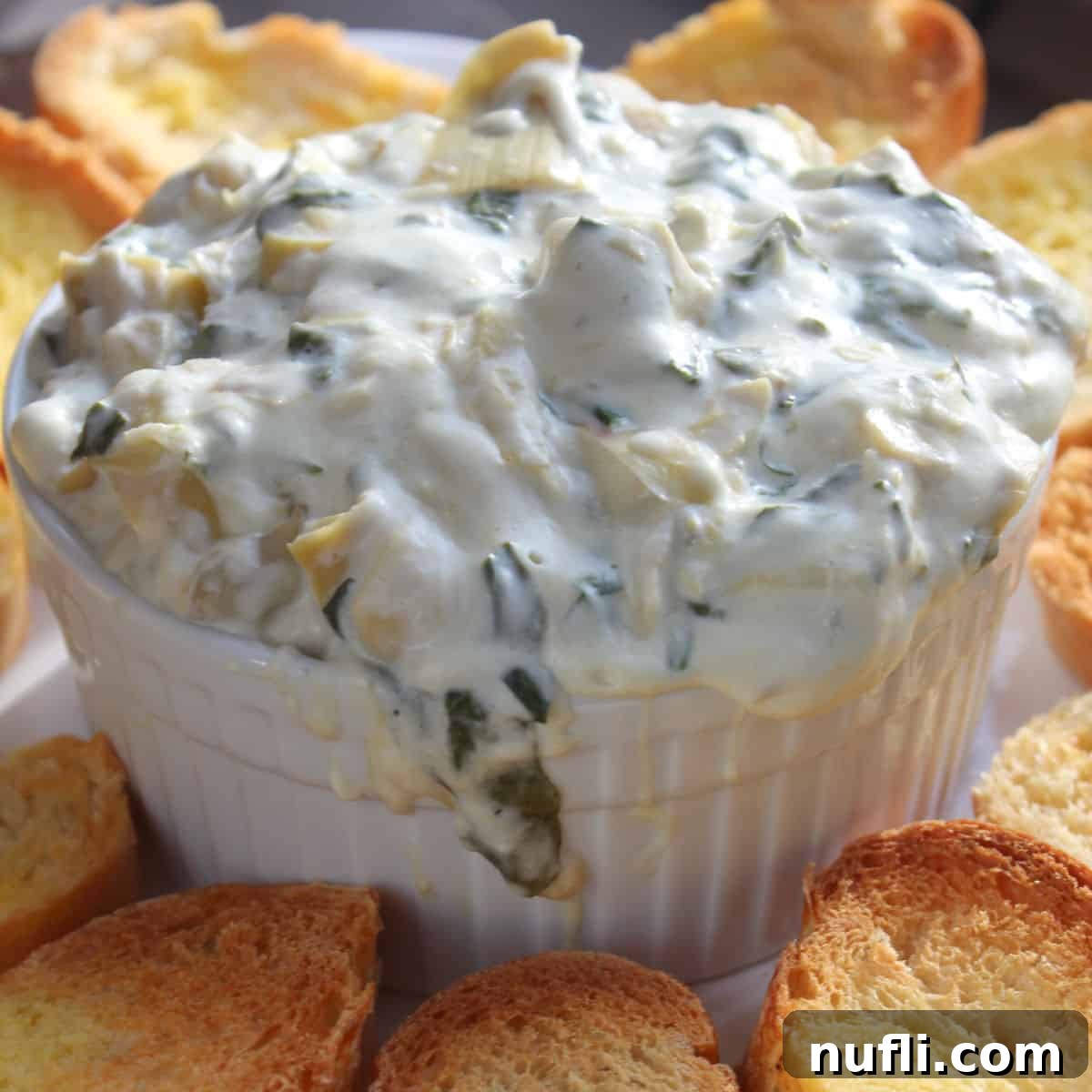 Creamy Crock Pot Spinach Artichoke Dip 1 featured 67790