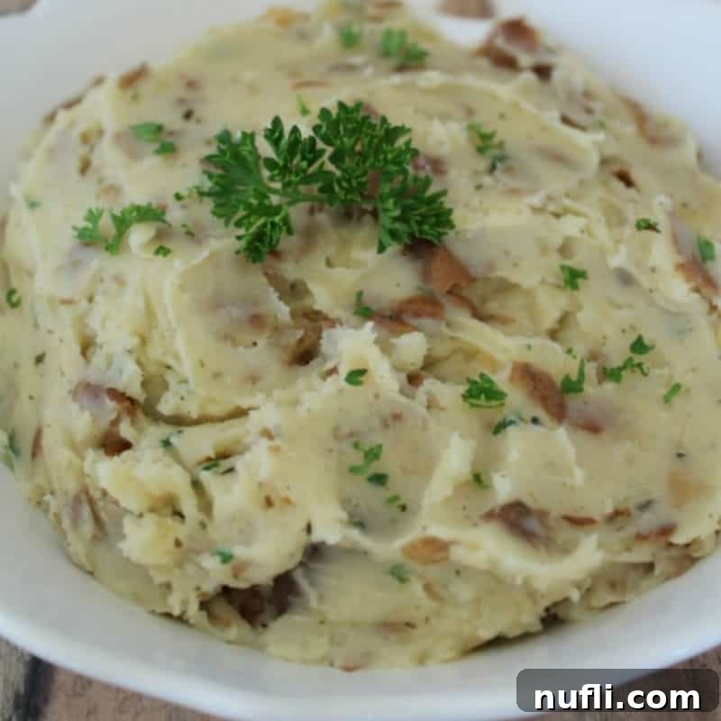 garlic herb mashed potatoes in a white bowl