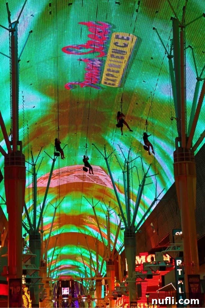 Riding Slotzilla at Fremont Street - Thrilling zip line experience over a lively street