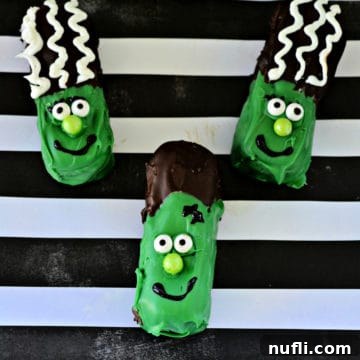 three Frankenstein Twinkies on striped paper