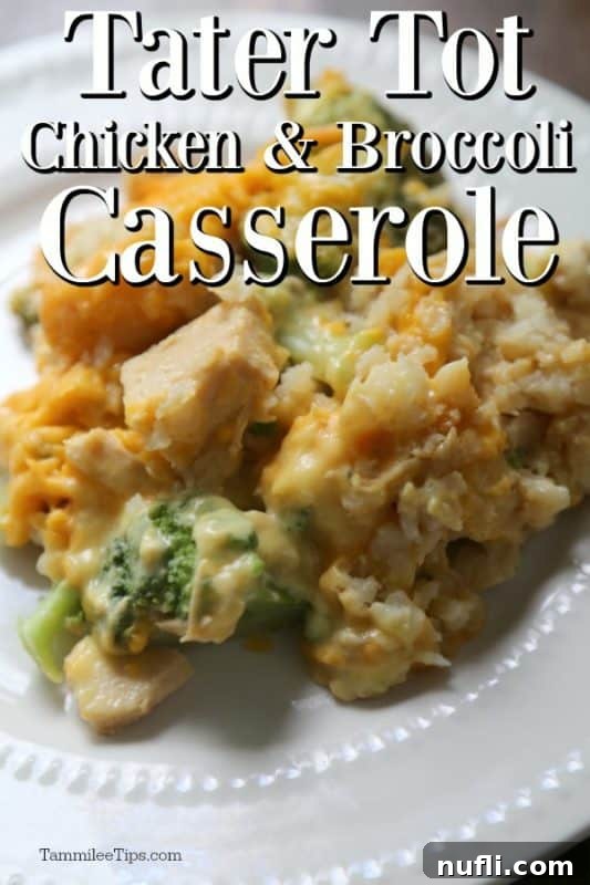 Tater Tot chicken and broccoli casserole over a white plate with casserole on it