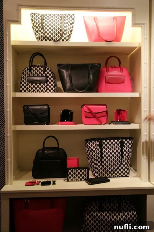 Vera bradley bags on shelves in pink and black & white
