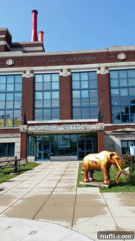 Experience Fort Wayne Indiana 5 City light and power building with golden elephant outside of Science Central