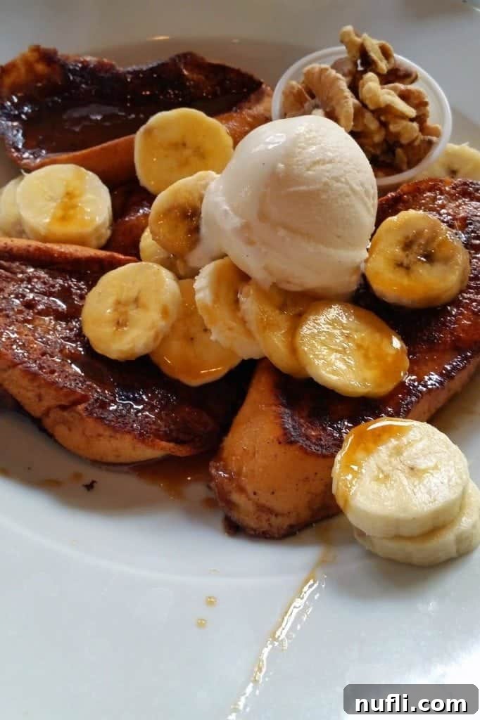 Decadent Bananas Foster French Toast from Stanley Restaurant New Orleans, a delightful brunch option.