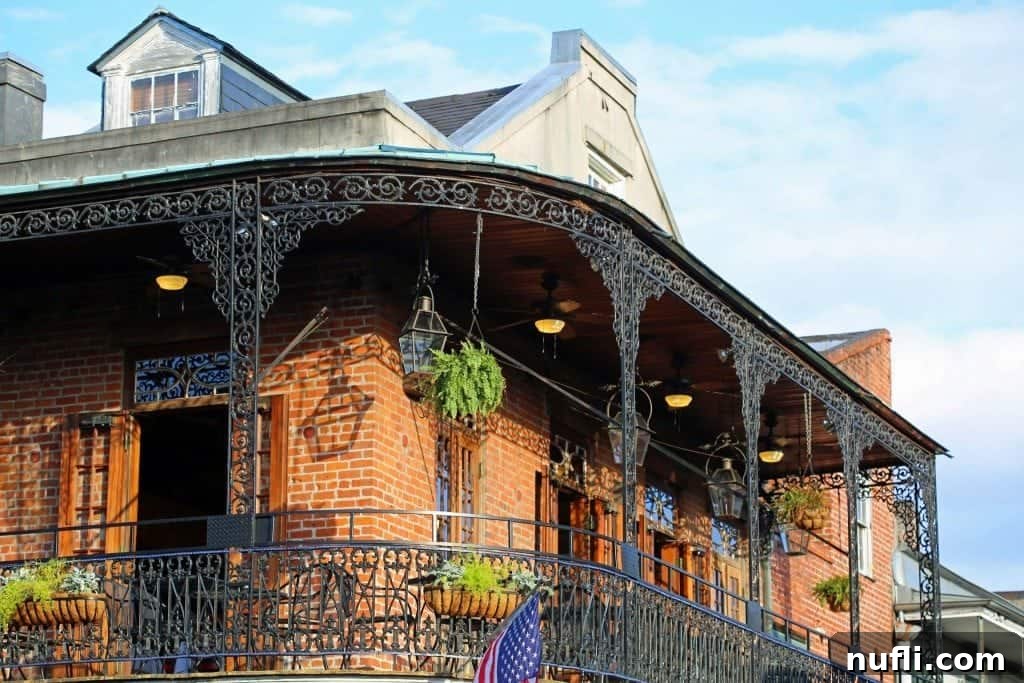 A beautifully decorated balcony in the French Quarter New Orleans, adding to the district's romantic allure.
