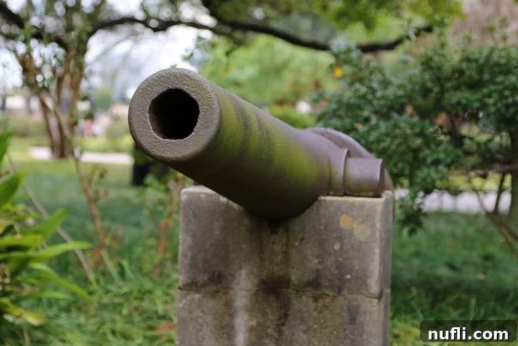 Tourists leisurely walking along a charming historic street in the French Quarter New Orleans, surrounded by classic architecture.