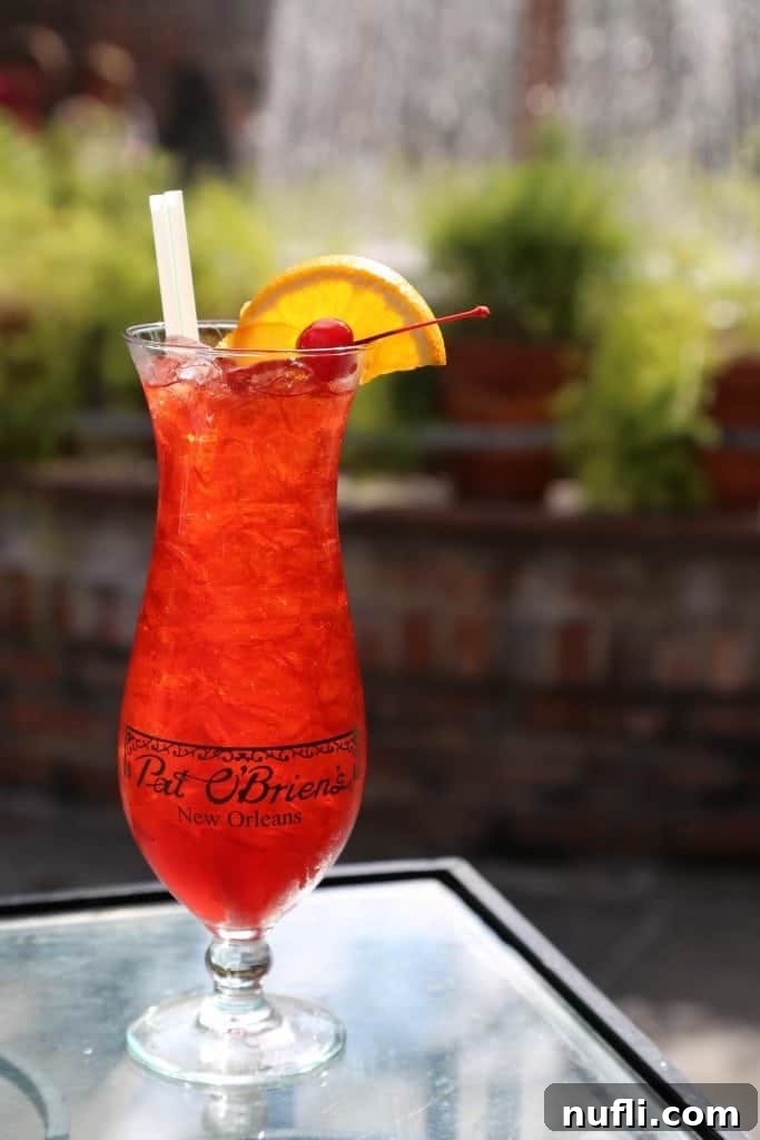 A refreshing Pat O'Brien's Hurricane Cocktail, a must-try classic New Orleans drink.