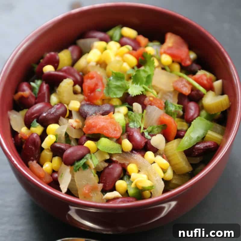 Crockpot Vegetable Chili in a red bowl