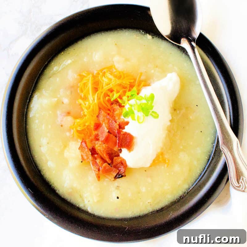 Creamy potato soup with bacon and sour cream