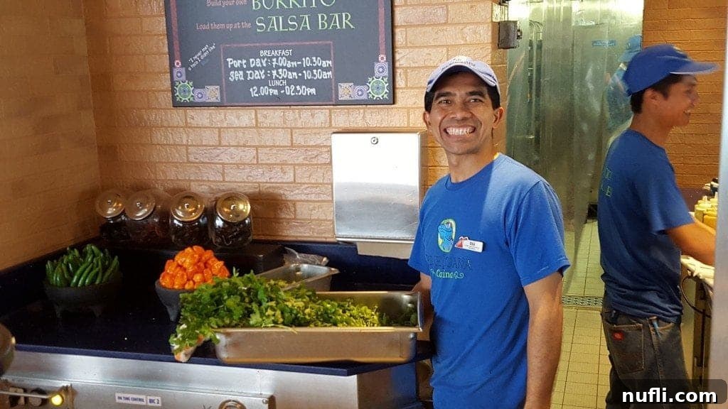 Carnival Conquest Docks in La Romana, Dominican Republic 3 Friendly Iquana Cantina employee smiling on Carnival Conquest