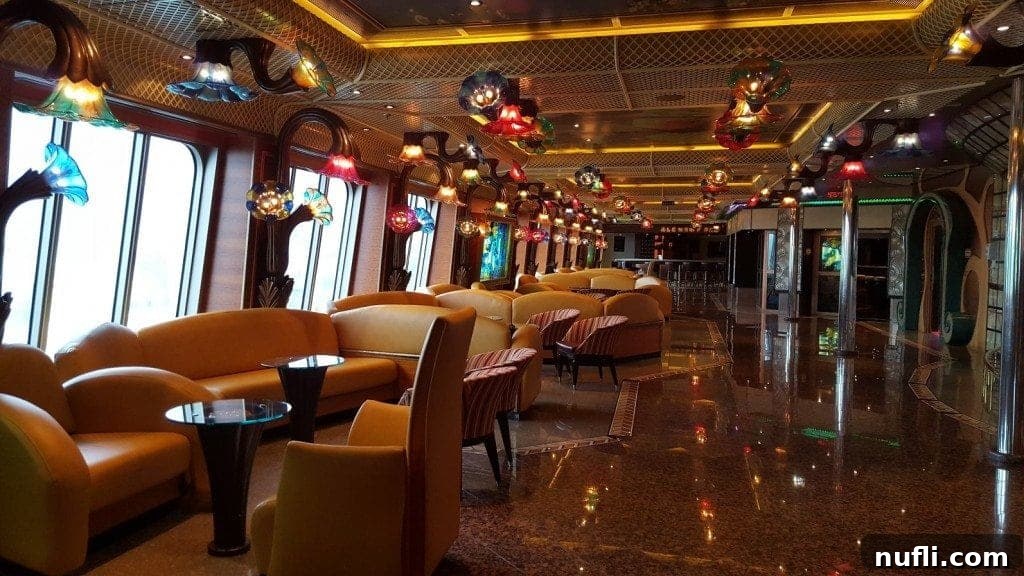 Carnival Conquest Docks in La Romana, Dominican Republic 5 Scenic Deck 5 walkway on Carnival Conquest overlooking the ocean