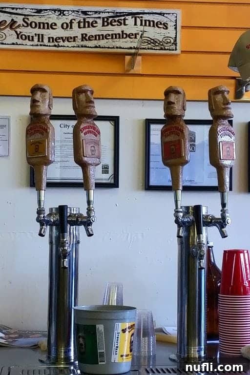 Close-up of shiny beer taps at Stoneyhead Brewing Company's bar