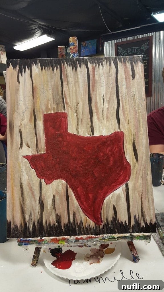 Progress shot of a painting at 'Painting with a Twist,' showcasing vibrant colors and developing details.