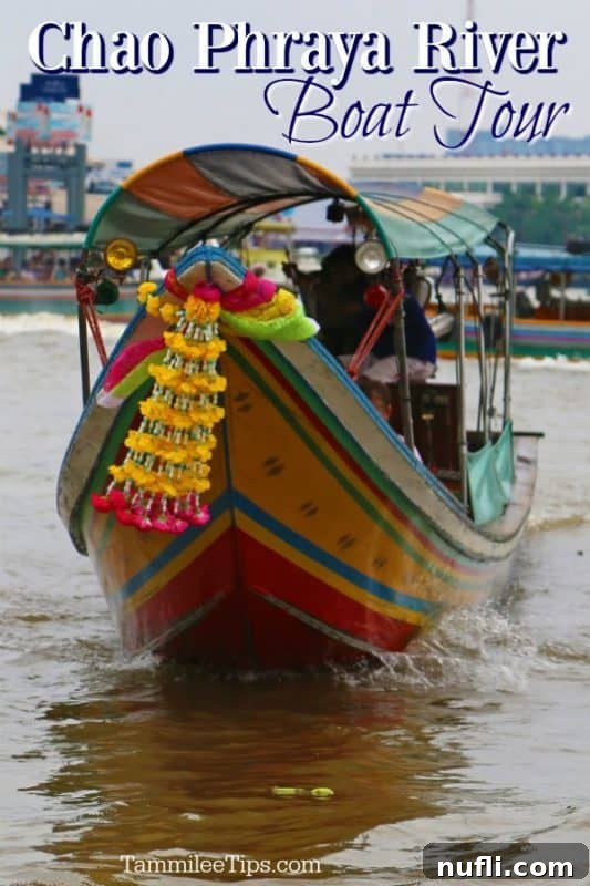 Bangkok Chao Phraya River Cruise 2 A traditional longtail boat gliding across the Chao Phraya River during a boat tour in Bangkok, Thailand, with the city skyline in the background.