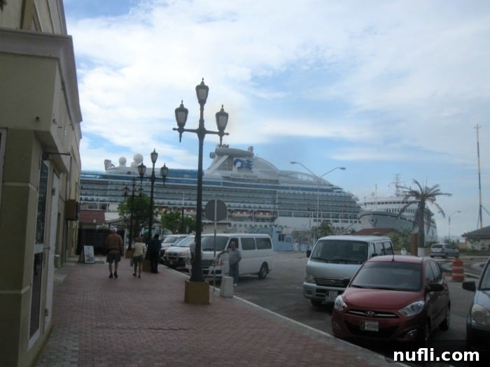 Aruba Cruise Highlights 12 Princess Cruise Ship in port in Aruba with cars parked along the side of the road