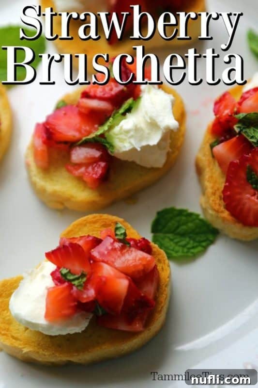Sweet Strawberry Bruschetta Bites 2 Vibrant Strawberry Bruschetta elegantly arranged on a white platter, garnished with fresh mint leaves.