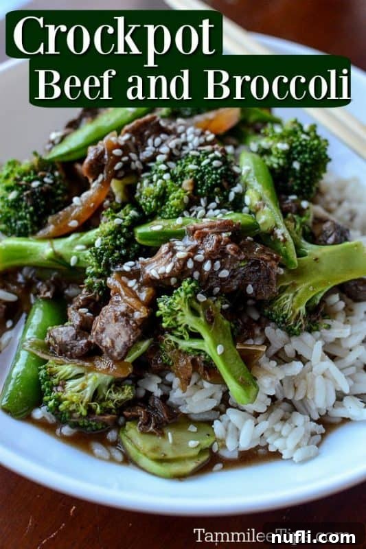 Slow Cooker Beef and Broccoli 2 Crockpot Beef and Broccoli over a bowl filled with rice, broccoli, and sliced beef