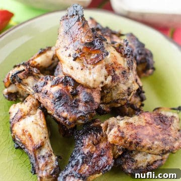 Crockpot Jamaican Jerk Wings Recipe on a green plate