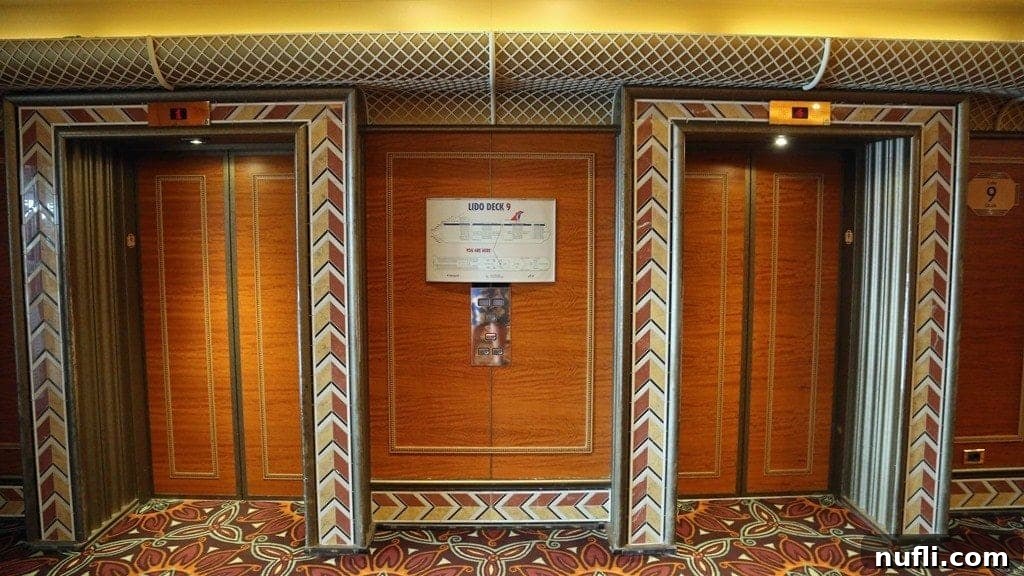 Elevators with a carnival conquest ship map between them