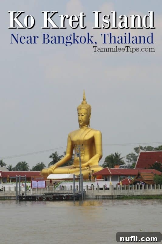 Ko Kret Island near Bangkok over a golden Buddha statue, reflecting the island's spiritual tranquility