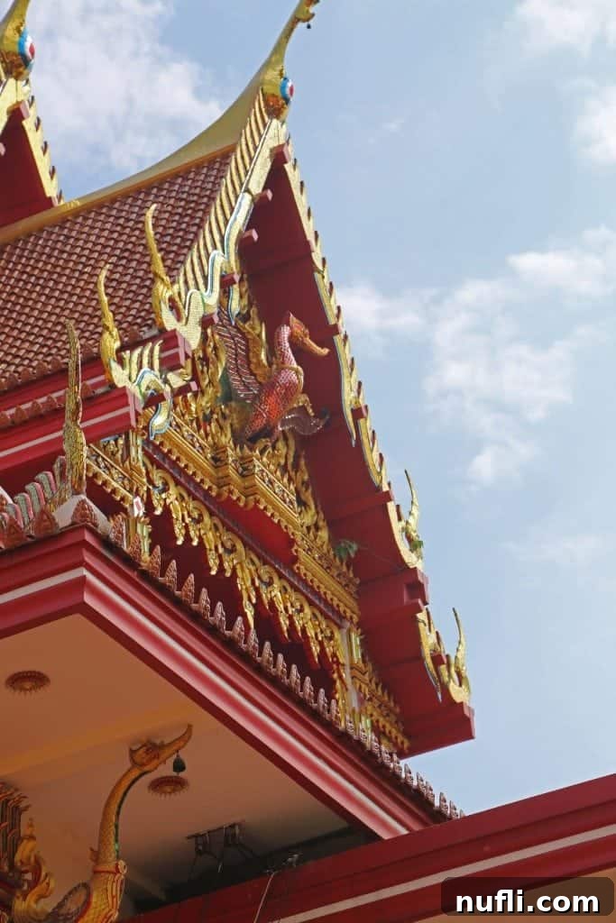 Local street food vendor preparing dishes at Ko Kret market
