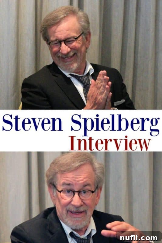 Steven Spielberg and Ruby Barnhill smiling during their interview for The BFG, a captivating look into their on-screen and off-screen chemistry.
