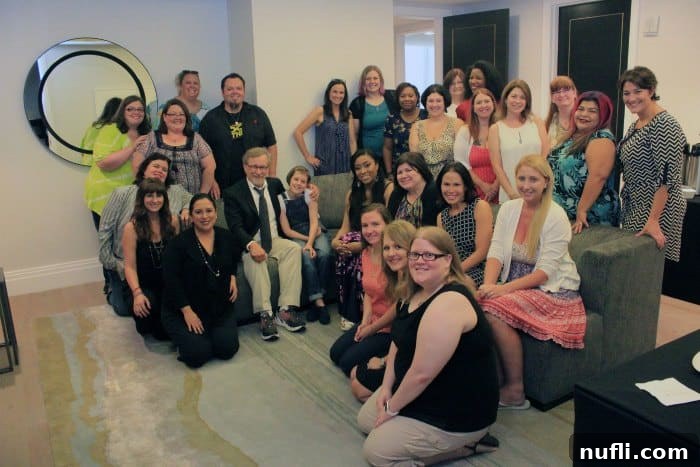 Group photo with Steven Spielberg and interviewers, capturing a memorable moment from The BFG press tour.