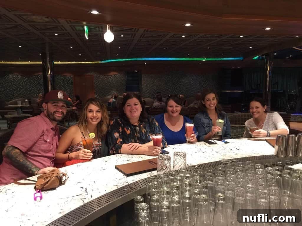 Carnival's Alchemy Bar: The Ultimate Cruise Hotspot 4 Close-up of a beautifully garnished custom cocktail crafted at the Alchemy Bar