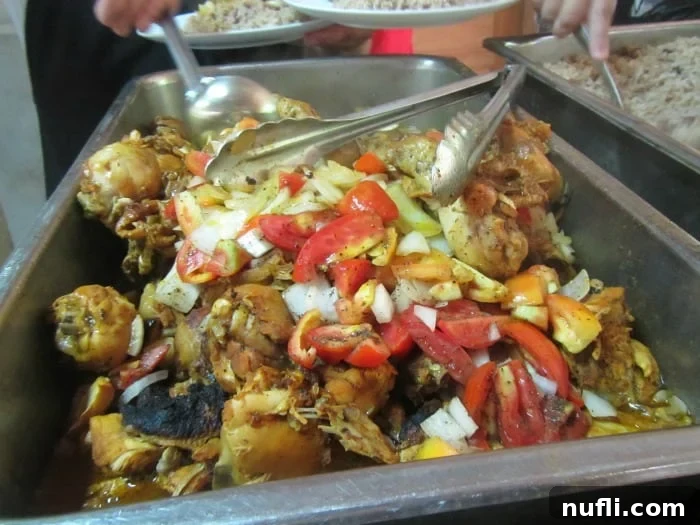 Belize's Epic Cave Tubing Adventure 16 chicken and veggies in a serving dish