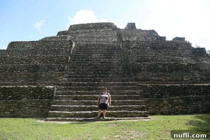 Unearthing Chacchoben Mayan Legacy Costa Maya 5 Traveler standing in awe before the majestic Chacchoben Mayan Ruins