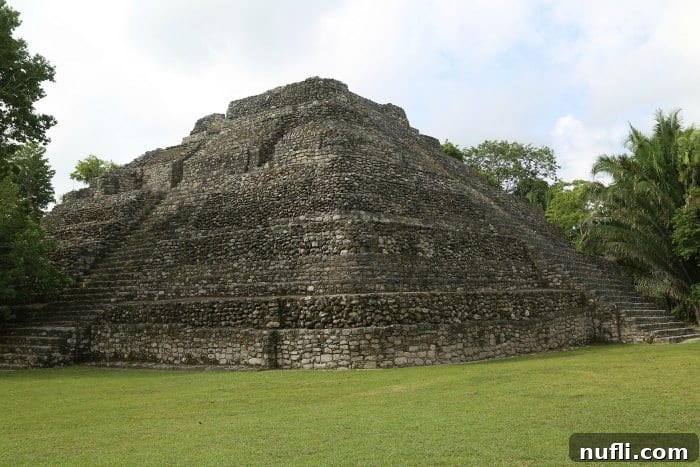 Unearthing Chacchoben Mayan Legacy Costa Maya 9 Lush green grass framing a sprawling Chacchoben Mayan structure