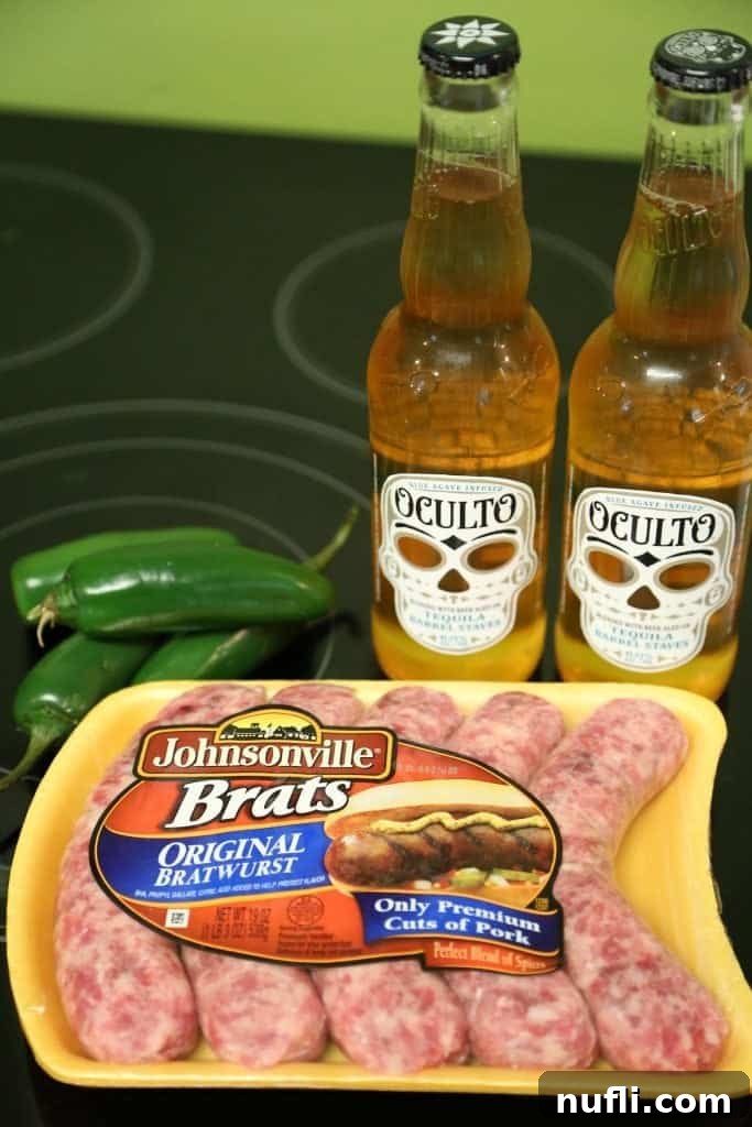 Bold Jalapeno Beer Brats 3 Jalapeno Beer Brats ingredients laid out on a cutting board