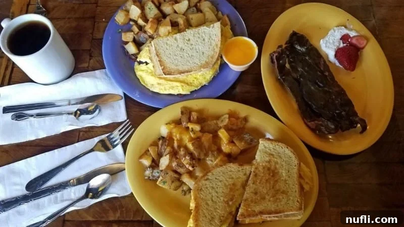 Two vibrant plates showcasing a delicious breakfast spread: one with a fluffy omelet and steak, the other with golden toast, against a bright yellow and blue backdrop.
