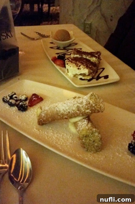 Canoli on white plates at La Strada