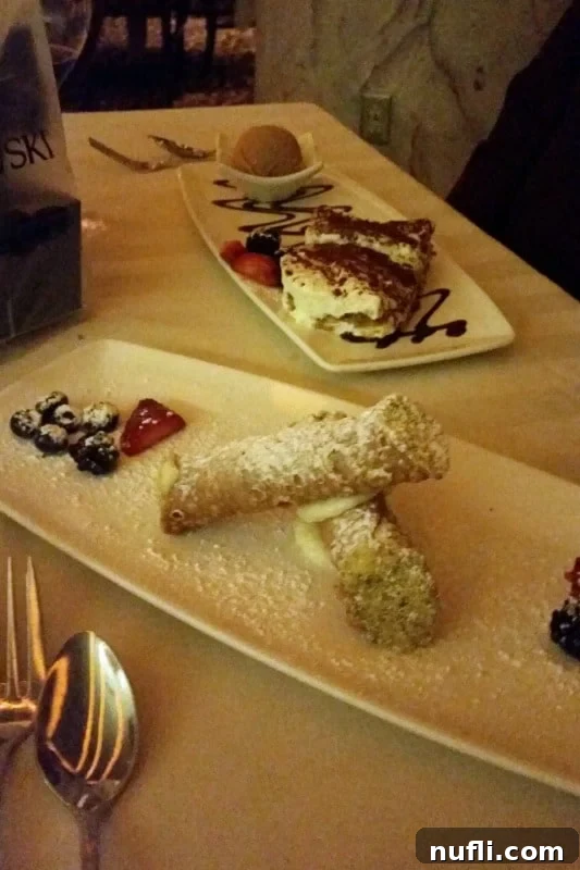 Canoli on white plates at La Strada