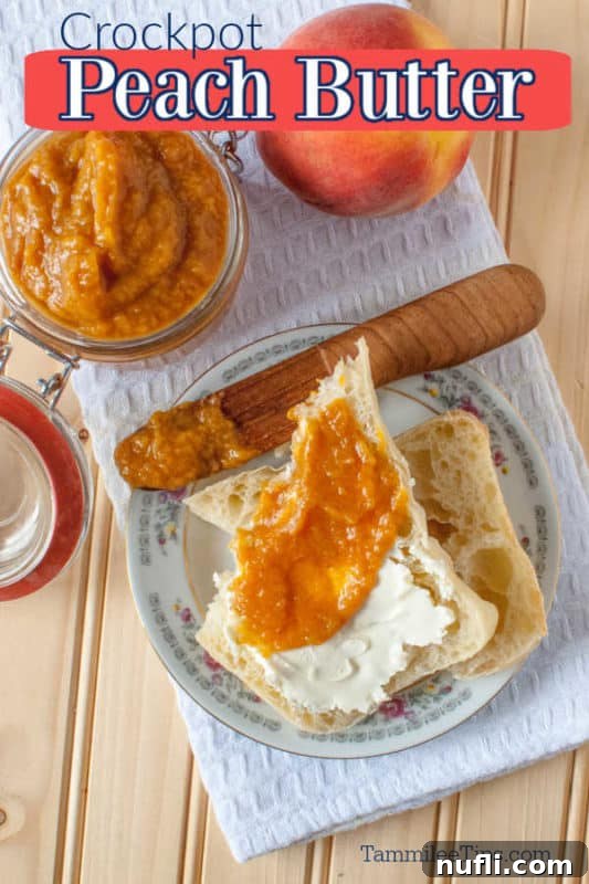 Luscious Crockpot Peach Butter 2 Homemade Crockpot Peach Butter served on a muffin, with a fresh peach and a glass jar of peach butter on a white napkin.