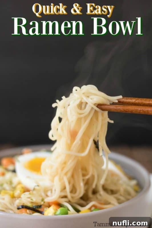 Quick and easy ramen bowl with chopsticks lifting noodles from the steaming broth, garnished with a sliced egg and green onions.