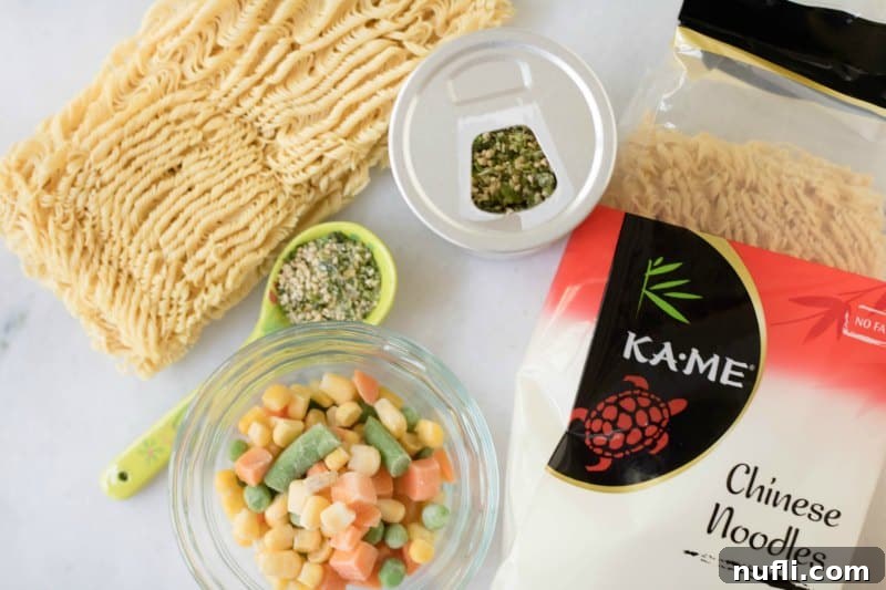Ingredients for a quick ramen bowl: a bag of ramen noodles, a package of frozen mixed vegetables, and various seasonings.
