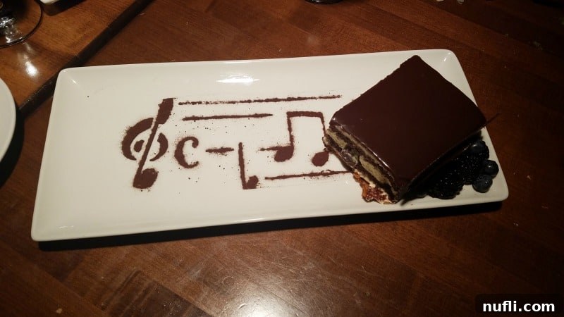 Decadent chocolate-dusted music symbol artfully arranged on a plate with dessert