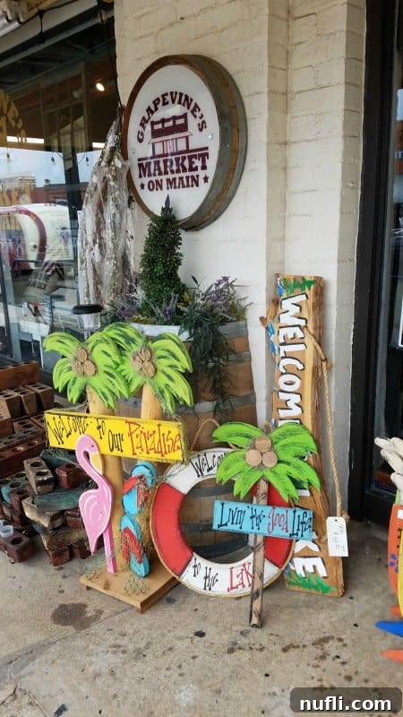 Prominent 'Grapevine Market on Main' sign, inviting visitors to explore the shopping and dining experiences along the historic street.