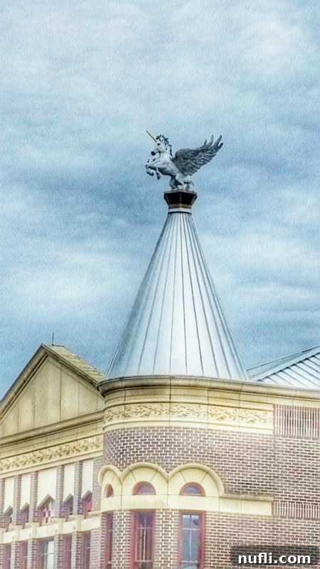 Grapevine's whimsical 'Imagine' Flying Unicorn statue perched atop a building, symbolizing dreams and magic.