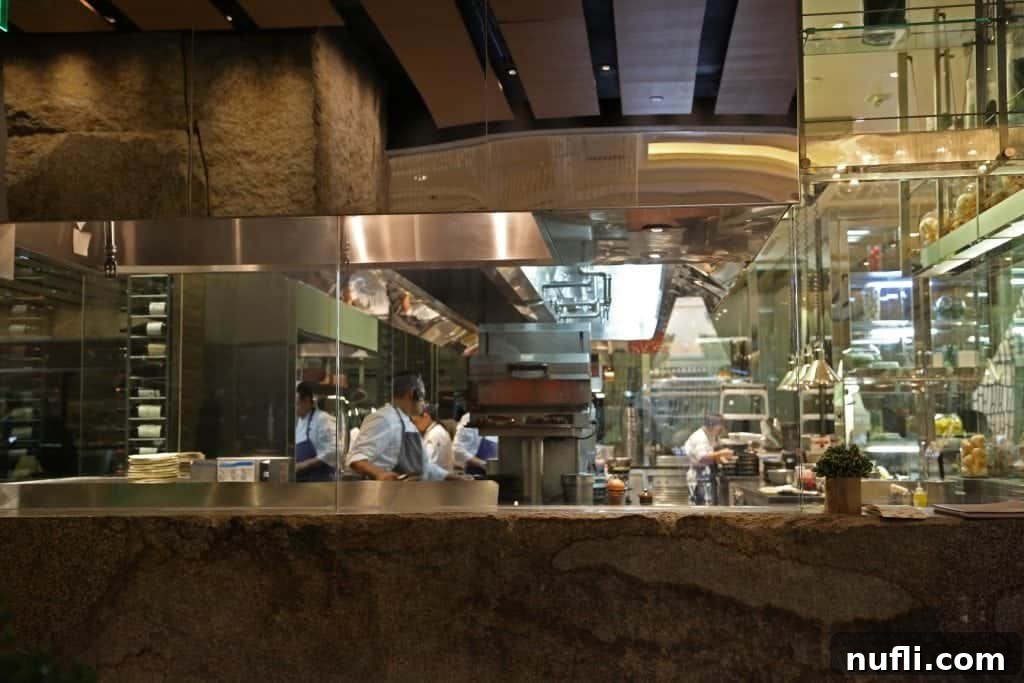 Close-up view of the busy kitchen area of Harvest in Bellagio