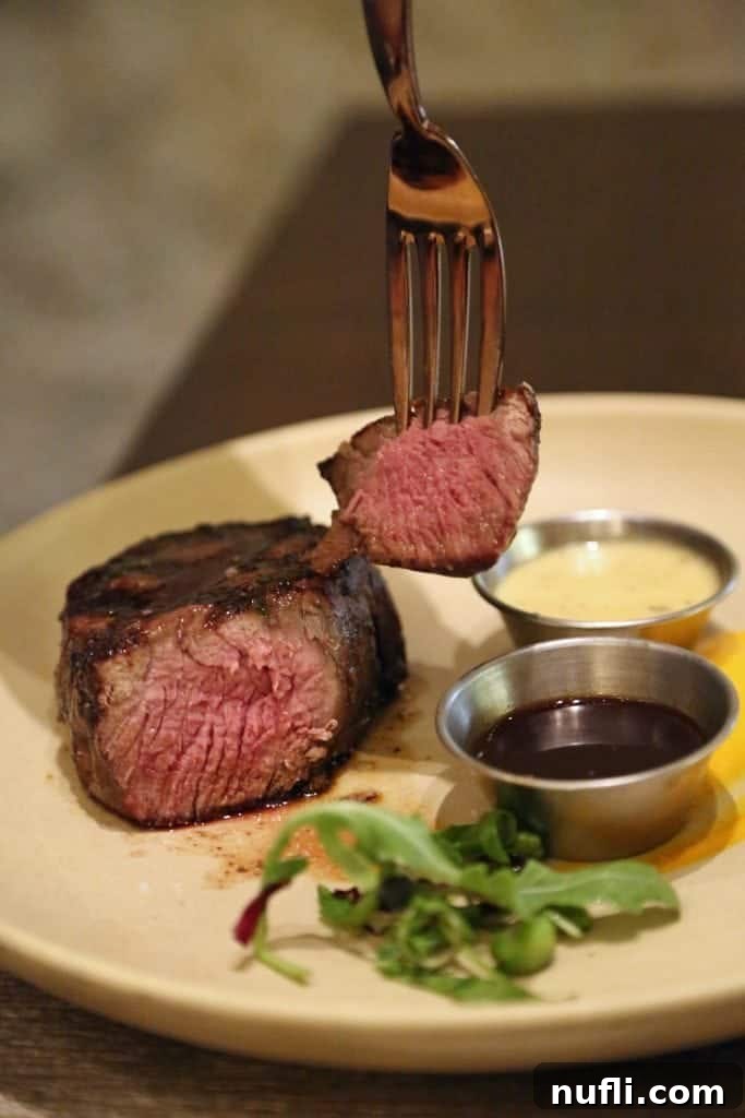 Close-up of a beautifully plated steak at Harvest in the Bellagio
