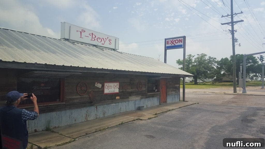 The exterior of T-Boys Cajun Grill, a rustic and inviting local eatery.