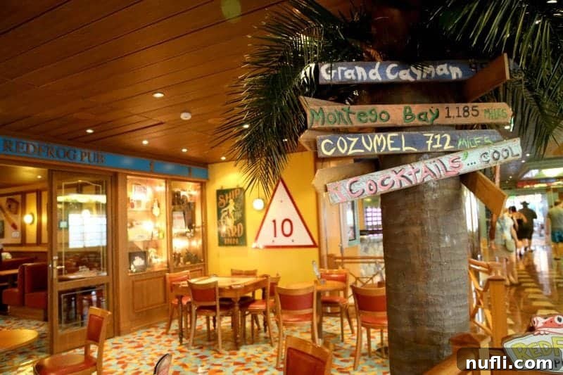The interior of the Red Frog Pub, featuring rustic directional signs, comfortable tables, and chairs, exuding a laid-back Caribbean atmosphere.