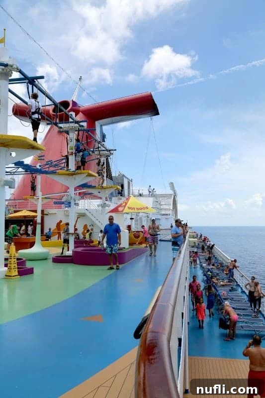 The Carnival Magic sports deck, featuring the iconic funnel and a dedicated walking track for active guests.