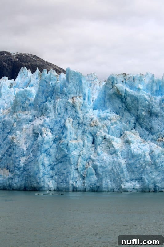 Glacier rising over the water 