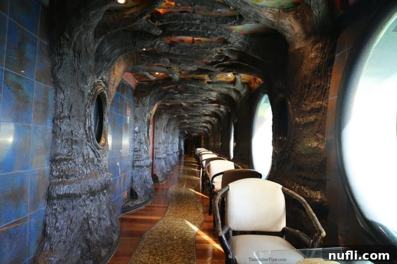 wakway with chairs on one side that looks like walking through a grotto 