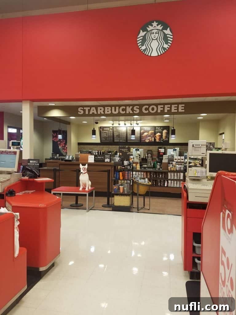 A Starbucks coffee shop sign visible inside a Target store, highlighting amenities.