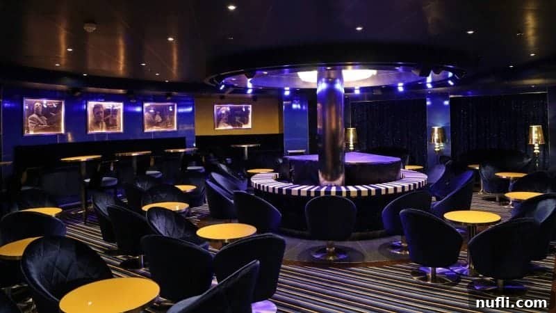 A vibrant piano bar area, with numerous tables and chairs comfortably arranged around the central piano, creating an inviting atmosphere.